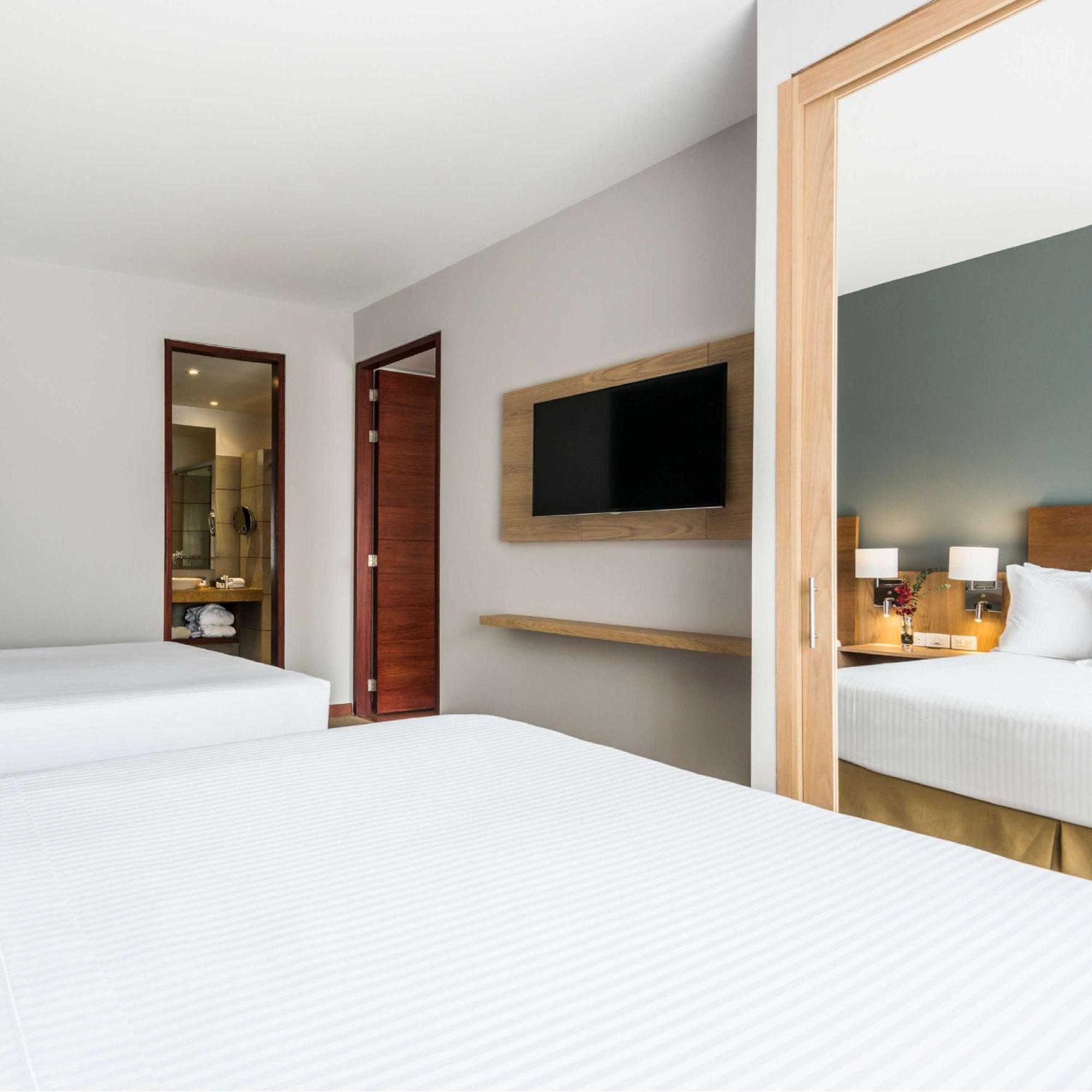 Cosmos 100 Hotel & Centro De Convenciones - Hoteles Cosmos Bogota Exterior photo A room at the hotel