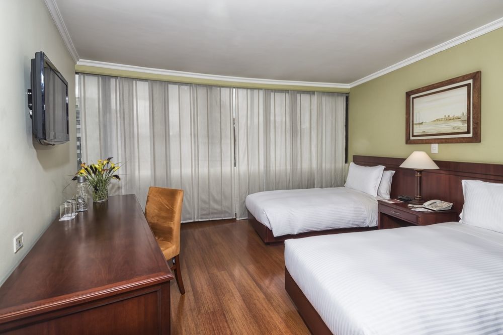 Cosmos 100 Hotel & Centro De Convenciones - Hoteles Cosmos Bogota Exterior photo A room at the hotel