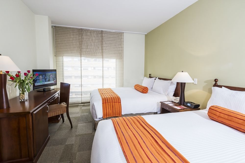 Cosmos 100 Hotel & Centro De Convenciones - Hoteles Cosmos Bogota Exterior photo A typical guest room at the Hilton Garden Inn
