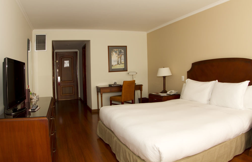 Cosmos 100 Hotel & Centro De Convenciones - Hoteles Cosmos Bogota Exterior photo A room at the hotel