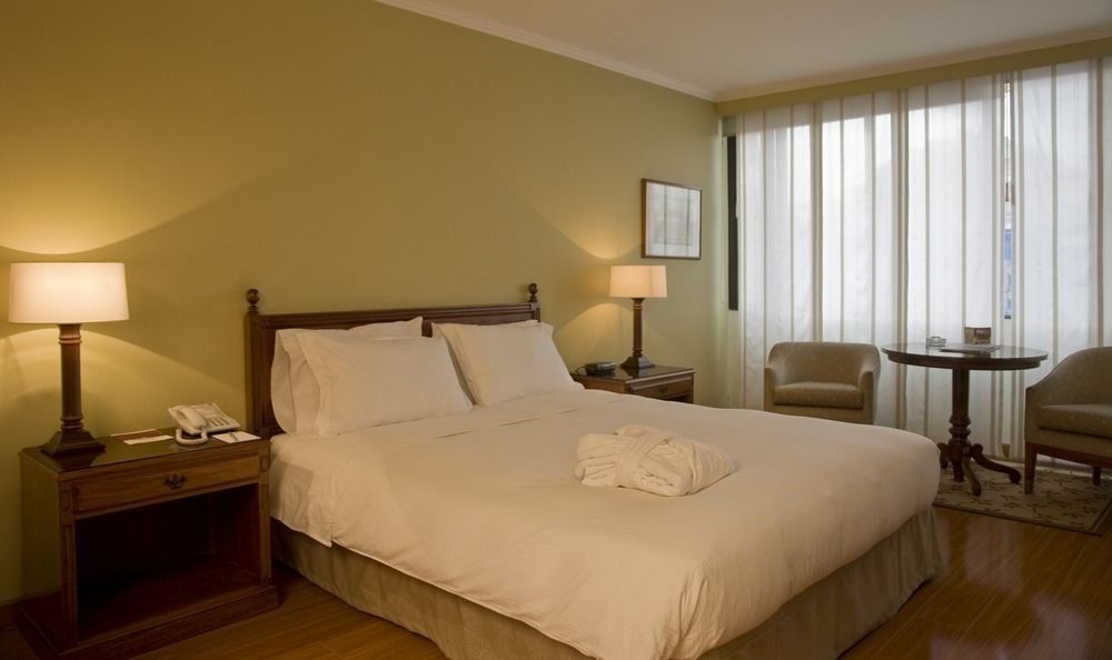 Cosmos 100 Hotel & Centro De Convenciones - Hoteles Cosmos Bogota Exterior photo A bedroom