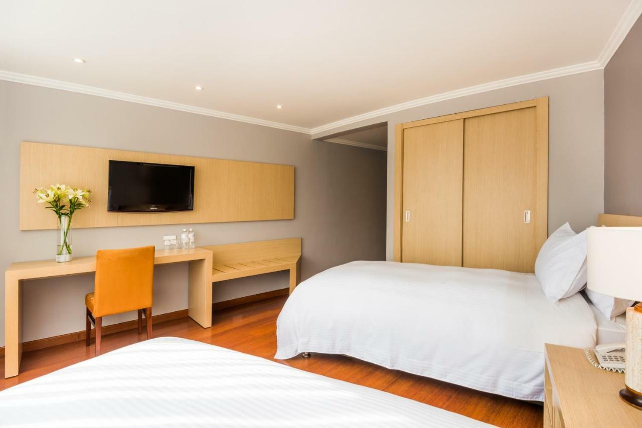 Cosmos 100 Hotel & Centro De Convenciones - Hoteles Cosmos Bogota Exterior photo A room at the hotel