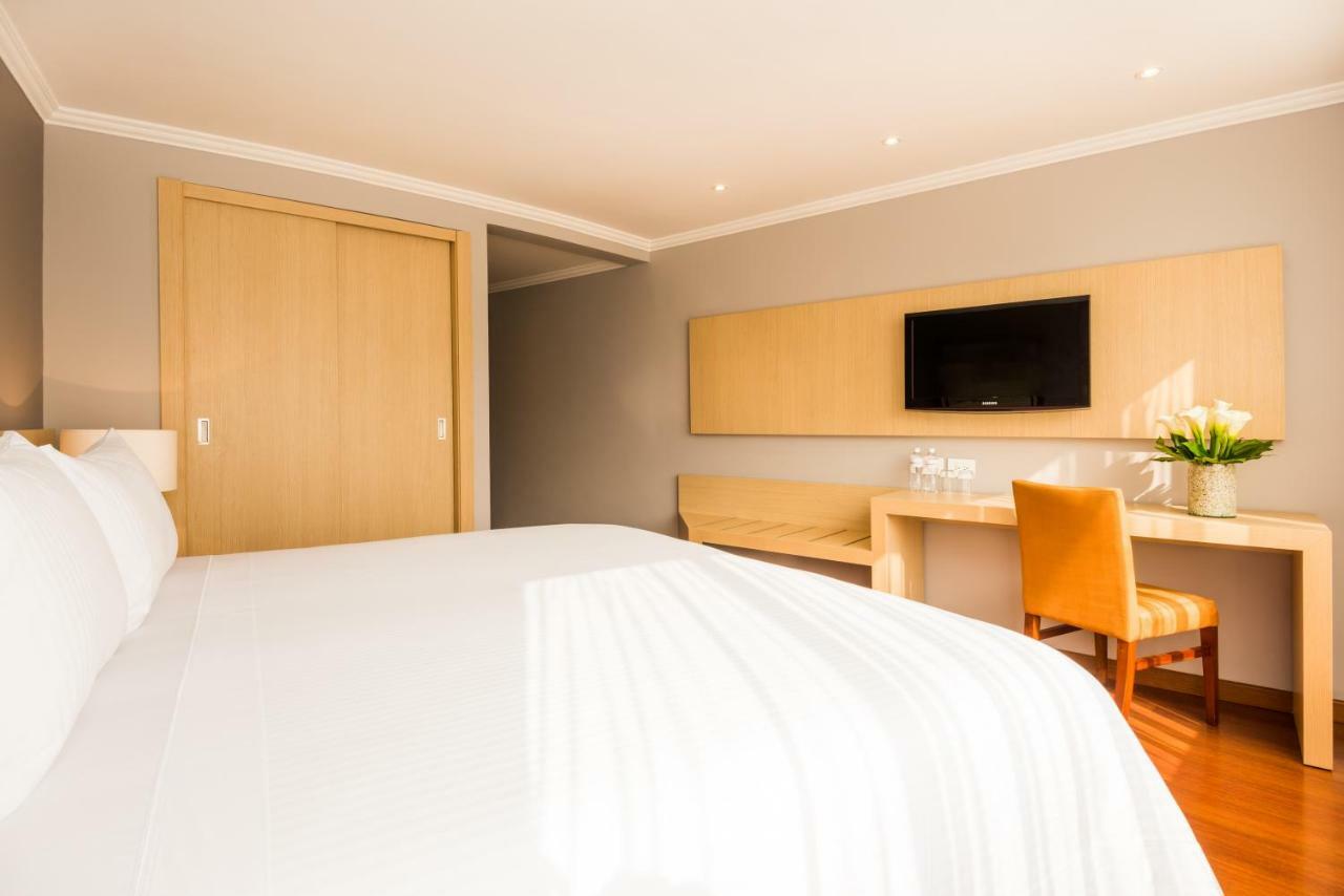 Cosmos 100 Hotel & Centro De Convenciones - Hoteles Cosmos Bogota Exterior photo A room at the hotel